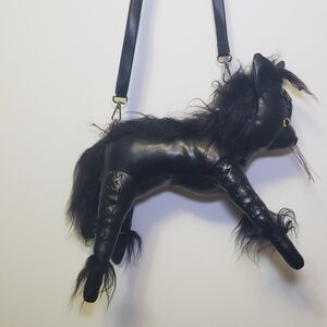 Dolls Kill Black Crossbody Bag with Yellow Eye Accents